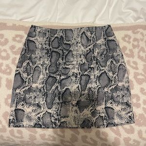 Snake mini skirt